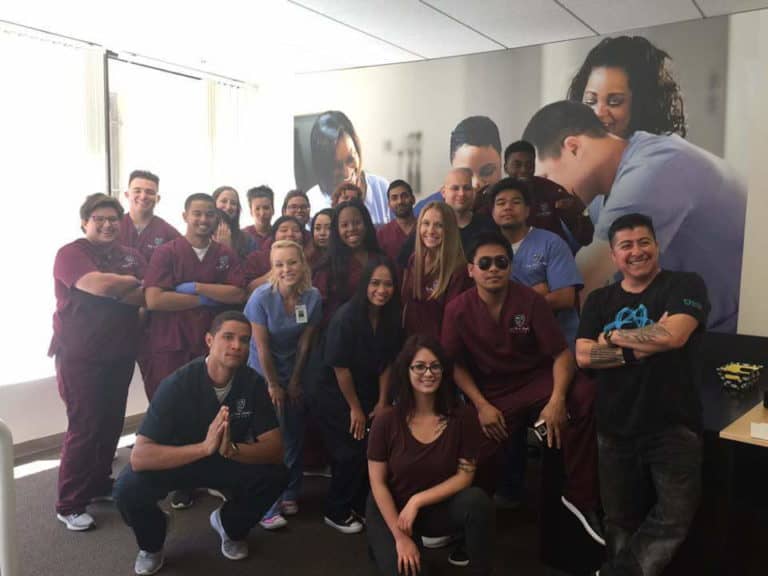 A Group of students, Teachers and parents posing for a group picture at the BAMA Institute.