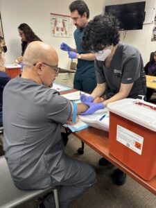 students in phlebotomy training